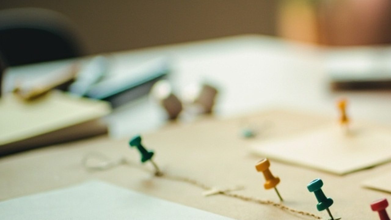 Plot timeline with turning-point cards, clue pins, and arrows for story structure planning.